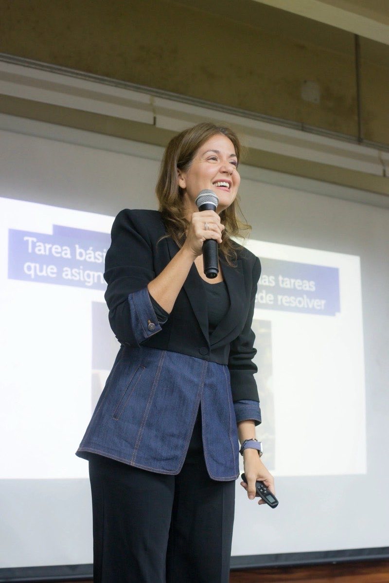 Dr. Florencia Gabriele speaking at a keynote